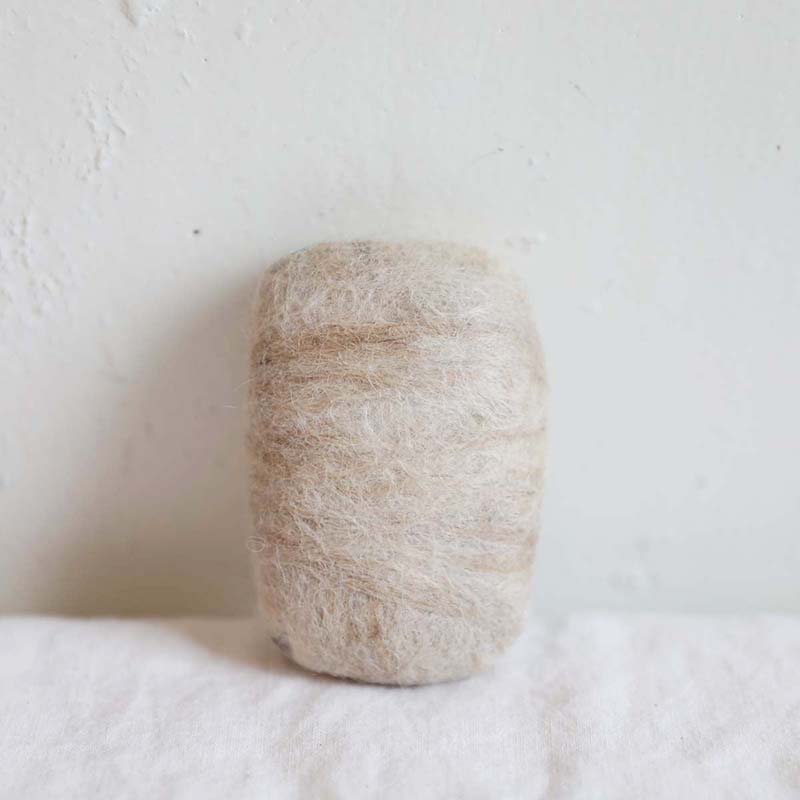 Cream natural felted alpaca soap ethically made by Awamaki in Peru