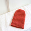 Knitted rosewood pampa cap by Awamaki made from alpaca wool