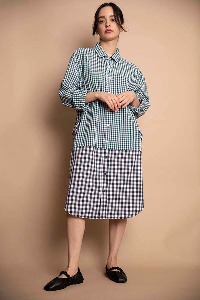 Cristina wears the double plaid reimagined boyfriend shirtdress. An exclusive capsule collection of 11 reworked vintage men shirts: the Reimagined Boyfriend Shirtdresses. Reuse is the most sustainable act of slow living.