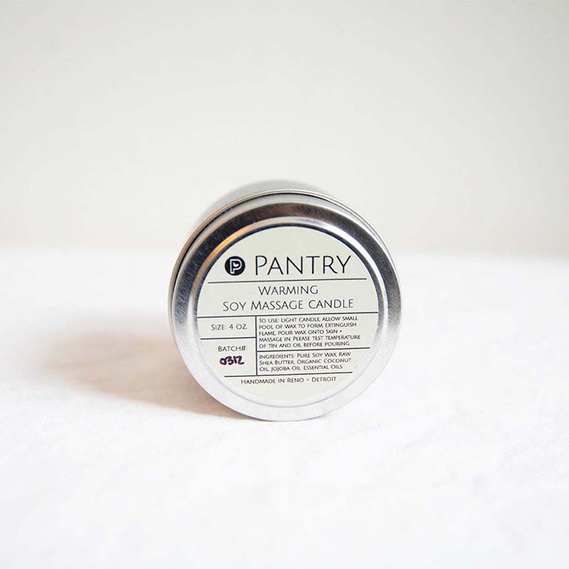 Small Pantry Product Warming Soy Massage Candle in an aluminum tin can. Handmade in Reno from pure soy wax, shea butter, coconut oil, jojoba oil and essential oils.