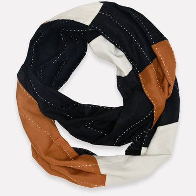 Anchal's black, brown and white scarf made of 100% cotton.