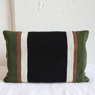 Foldover clutch with a striped pattern green, brown, white and black ethically made by Awamaki in Peru