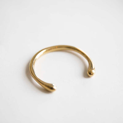 Bawa Hope's Artisan Made Brass Cuff is the perfect statement piece. This cuff can be styled with any outfit of your choosing for ease to wear.