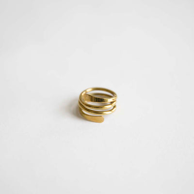 Spiral ring designed by Bawa Hope ethically made from sustainable brass