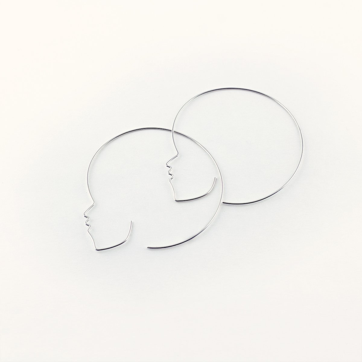 silver cara earrings by CURA Collection