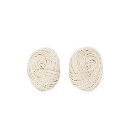 Pair of oval shaped earrings interwoven from raw cotton braided by hand to create the Nube Maxi Earrings