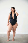 Black one piece swimsuit mindfully made in Los Angeles shown here on a size XL model