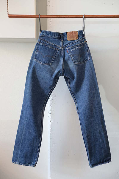 Vintage levis 501 with brave and beautiful quote on back pocket