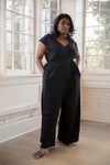 Geetu wears the Domoto jumpsuit by Cura in black. Ethically made in Cambodia