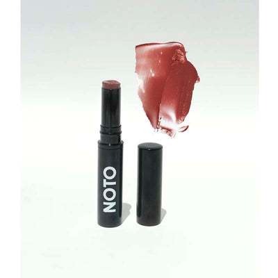 Noto multi bene stick in the color five a neutral mauve kiss with subtle undertones of dusty rose, brown and purple in a black aluminium tube
