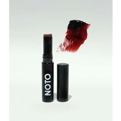 Noto Botanics classic multi-bene stain, in a sleek black aluminum tube. Easy to use multi-use color that builds, nourishes, and repairs in their deepest dark berry hue. Giving you a 90's throwback