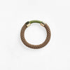 Pichulik brass Aruba bracelet in brown and olive green. Thin rope assembled with brass caps and embellished with wax cord.