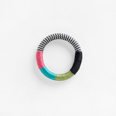 Pichulik Dynamic Bracelet in white zig zag, pink, aqua and fern colors. Loop-style rope configurations in woven static and dynamic rope, embellished with contrast wrapping