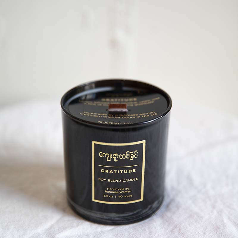 Handpoured soy blend candle with a wood wick scent is Gratitude by Prosperity Candles 