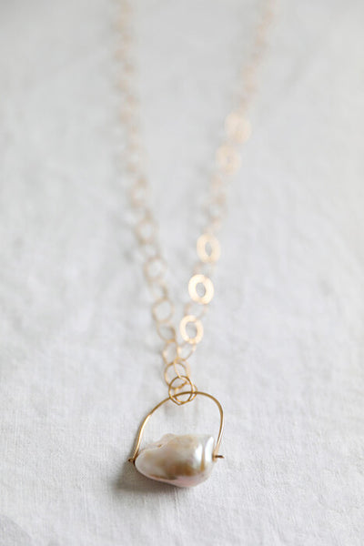 This pearl pendant is a stone to boost your self-confidence.