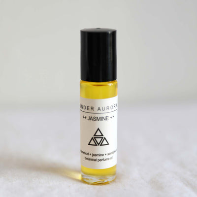 Hand-crafted botanical jasmine perfume rollerball oil ethically made by Under Aurora
